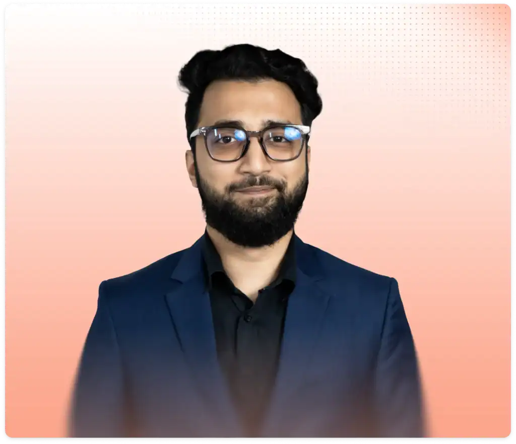 Professional portrait of Md Tawhid ur Rahaman in a suit and glasses.